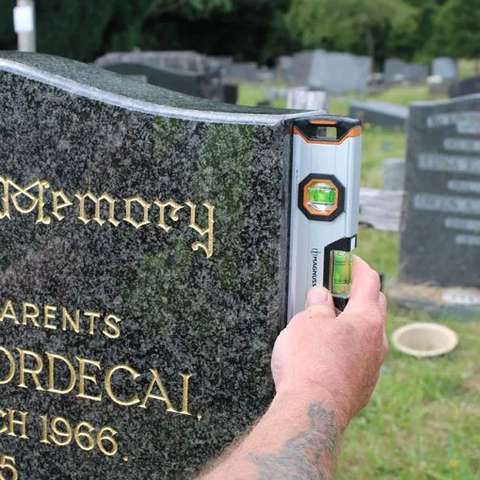 Memorial Re-levelling / Re-fixing